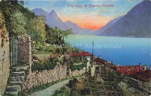 AK / Ansichtskarte Gandria Lago di Lugano TI Lago-di-Lugano Gasse Steinmauer Treppen Haeuser Berge Abenddaemmerung See