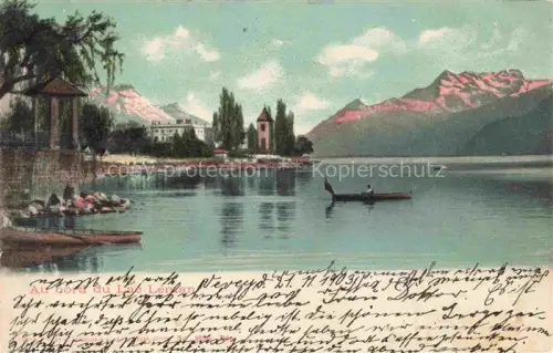 AK / Ansichtskarte Lac Leman Genfersee GE Lac-Léman Seeufer Boot Kirche Berge Baeume Ruderboot