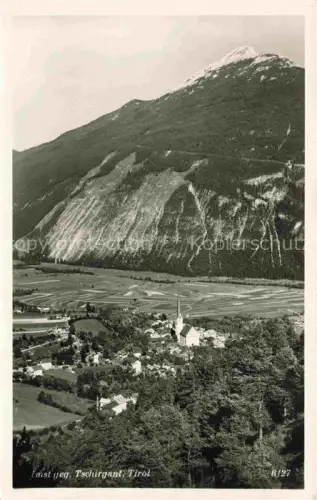 AK / Ansichtskarte Imst Tirol AT Tschirgant Bergdorf Kirchturm Talblick Inntal Berghang Wiesen