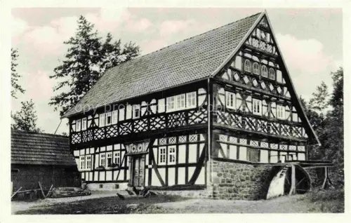 AK / Ansichtskarte Ilbeshausen-Hochwaldhausen Grebenhain Hessen Teufelsmuehle Fachwerkhaus Wasserrad Muehle Vogelsberg