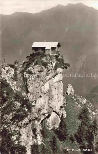 AK / Ansichtskarte Puerschlinghaus 1564m Garmisch-Partenkirchen Berghaus Felsenpanorama Felsen Berge Almhuette Steilwand Bergmassiv