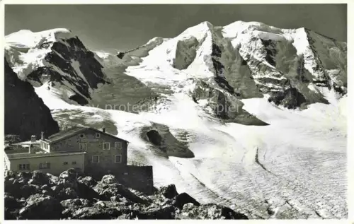 AK / Ansichtskarte Diavolezza GR Diavolezzahuette Piz-Palue Gletscher Bergmassiv Schnee Engadin Berghuette Felsen