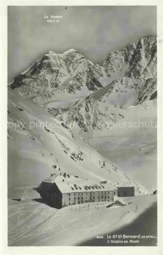 AK / Ansichtskarte Grand-St-Bernard 2469m Martigny VS Hospice Le-Combin Schnee Winterlandschaft Hochgebirge Hospiz Gebaeude