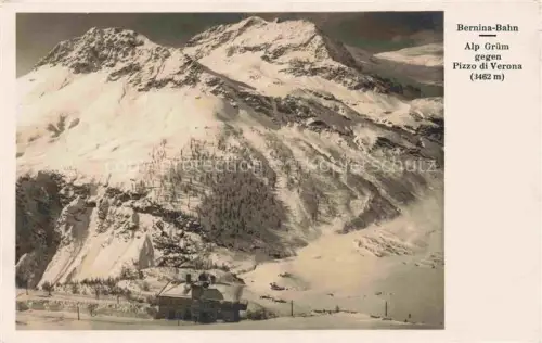 AK / Ansichtskarte Alp Gruem Bernina GR Pizzo-di-Verona Schnee Berge Bergstation Gebaeude Wald Berglandschaft