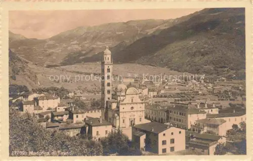 AK / Ansichtskarte Madonna di Tirano Sondrio Lombardia IT Basilika Kirchturm Bergtal Ortschaft Daecher Wiesen