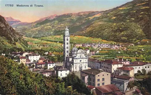 AK / Ansichtskarte Madonna di Tirano Sondrio Lombardia IT Basilika Kirchturm Bergtal Ortschaft Daecher Weinberge Handkoloriert