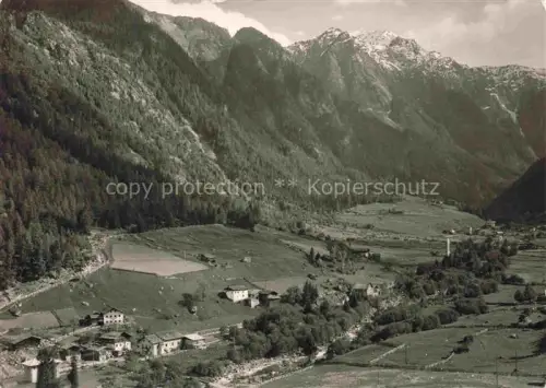 AK / Ansichtskarte Martell  Vinschgau Bozen Suedtirol IT Talblick Bergwiesen Berghuetten Wald Schneeberge Hochgebirge Bergdorf