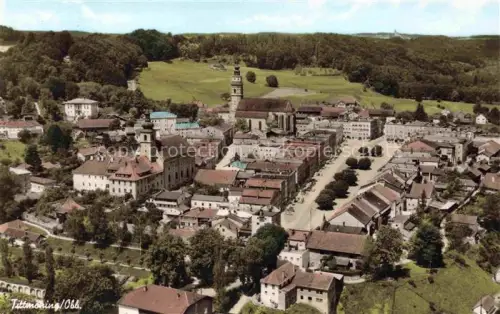AK / Ansichtskarte Tittmoning Salzach Marktplatz Kirchturm Stadtkirche Burg Daecher Waelder Huegel Ortszentrum