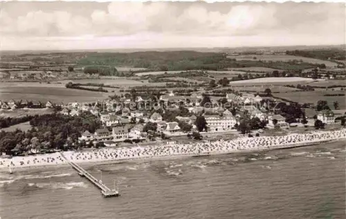 AK / Ansichtskarte SCHARBEUTZ Ostseebad Schleswig-Holstein Strand Strandkoerbe Seebruecke Ostsee Villen Felder Luftbild