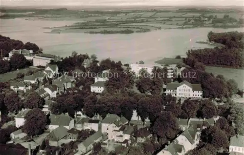 AK / Ansichtskarte Bad Segeberg Segeberger-See See Altstadt Wohnhaeuser Baeume Felder Luftbild