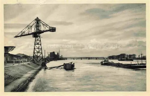AK / Ansichtskarte Heppenheim Wiese WORMS Rheinland-Pfalz Hafen Rhein Portalkran Binnenschiff Bruecke Industrieanlagen Ufer