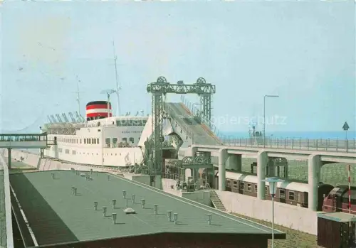 AK / Ansichtskarte Rodbyhavn DK Kong-Frederik Faehrschiff Faehrhafen Eisenbahnfaehre Verladebruecke Ostsee