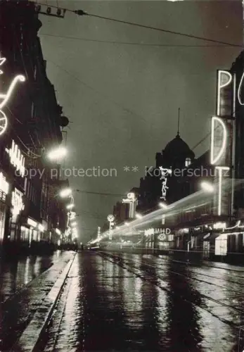 AK / Ansichtskarte KATOWICE Kattowitz PL Ulica-3-Maja Nacht Neonreklame Strassenbahn Schienen nasse-Strasse Regen Geschaefte