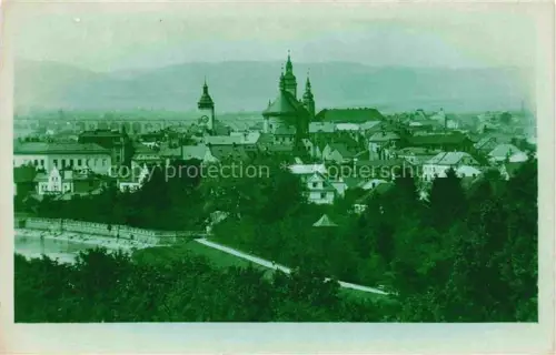 AK / Ansichtskarte Hranice na Morave Maehrisch Weisskirchen CZ Stadtansicht Kirche Kirchturm Fluss Daecher Berge Panorama