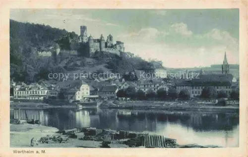 AK / Ansichtskarte Wertheim Main BW Burg Main Altstadt Kirchturm Holzlager Ufer Flussansicht Haeuser