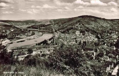 AK / Ansichtskarte Wertheim Main BW Stadtpanorama Main Burg Haeuser Huegel Wald Bruecke Flusstal