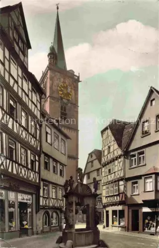 AK / Ansichtskarte Wertheim Main BW Engelbrunnen Kirchturm Fachwerkhaeuser Altstadt Marktplatz Brunnen