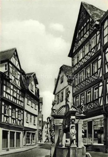 AK / Ansichtskarte Wertheim Main BW Engelsbrunnen Brunnen Fachwerkhaus Altstadt Gasse Figuren Geschaefte