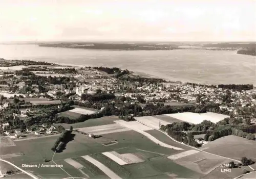 AK / Ansichtskarte Diessen Ammersee Fliegeraufnahme Ammersee Ortspanorama Felder Wald Kirchturm