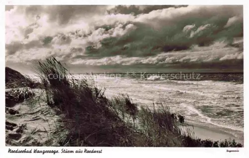 AK / Ansichtskarte WANGEROOGE Wangeroog Nordseebad Strand Duenen Strandgras Nordseewellen Sturm Wolken Meereskueste