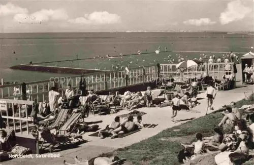 AK / Ansichtskarte Norddeich  Norden Nordseebad Niedersachsen Strandbad Liegestuehle Badegaeste Schwimmbad Mole Sonnenschirm Strandleben Nordsee