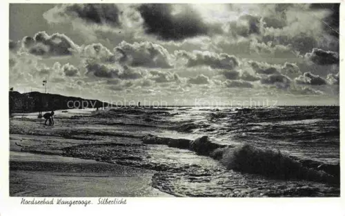 AK / Ansichtskarte WANGEROOGE Wangeroog Nordseebad Strand Wellen Nordsee Silberlicht Wolken Gegenlicht Spaziergaenger Duenen