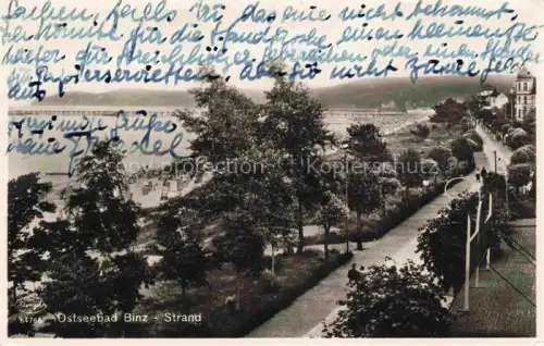 AK / Ansichtskarte BINZ Ruegen Strand Promenade Baeume Strandpromenade Meer Seeblick Laternenpfahl