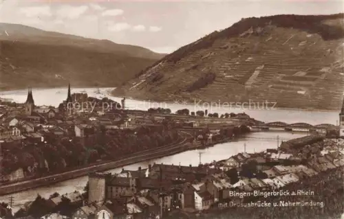 AK / Ansichtskarte Bingen Rhein Rheinland-Pfalz Drususbruecke Nahemuendung Rhein Panorama Weinberge Stadtansicht Kirche Bingerbrueck