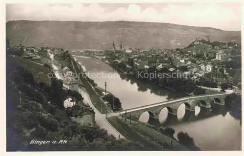 AK / Ansichtskarte Bingen Rhein Rheinland-Pfalz Nahe Rhein Bruecke Weinberge Stadtansicht Kirche-Tuerm Panorama