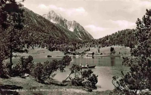 AK / Ansichtskarte MITTENWALD Bayern Lautersee See Wetterstein Bergpanorama Ruderboot Almhuetten Wald Berge