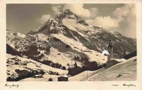AK / Ansichtskarte Warth Vorarlberg AT Biberkopf Kirche Schnee Berge Winterlandschaft Wald