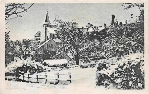 AK / Ansichtskarte Kronenburg Eifel Dahlem Euskirchen NRW Eifel Winterlandschaft Kirche Kirchturm Schnee Dorf Zaun Baeume Luftkurort