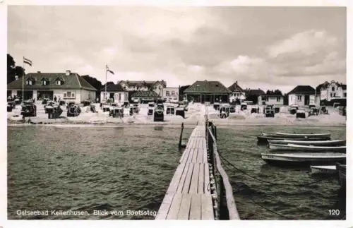 AK / Ansichtskarte KELLENHUSEN Ostseebad Schleswig-Holstein Bootssteg Ostsee Strand Strandkoerbe Boote Haeuser Fahnen