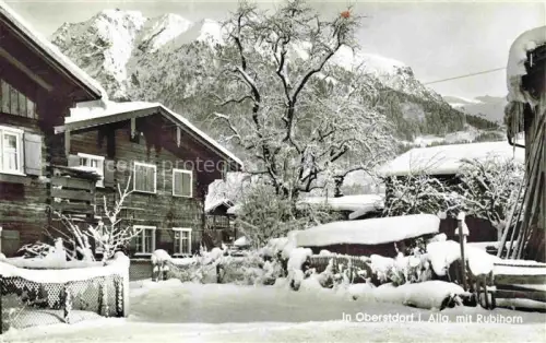 AK / Ansichtskarte OBERSTDORF Bayern Rubihorn Winter Schnee Holzhaeuser Berge Ski Allgaeu