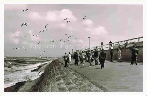 AK / Ansichtskarte NORDERNEY Nordseebad Niedersachsen Strandpromenade Nordsee Moewen Wellen Touristen Promenade