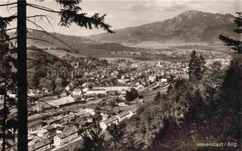 AK / Ansichtskarte Immenstadt Allgaeu Bayern Allgaeu Gruenten Panorama Kirche Daecher Bahnhof Berge Wald