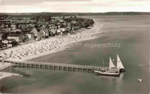 AK / Ansichtskarte NIENDORF Timmendorfer Strand Ostseebad Strand Seebruecke Strandkoerbe Segelboot Luftbild Promenade Timmendorfer-Strand