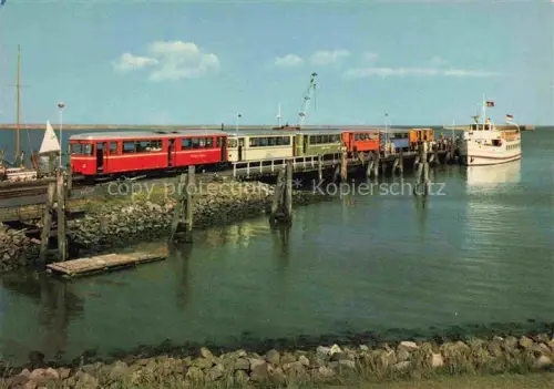 AK / Ansichtskarte LANGEOOG Nordseebad Inselbahn Anleger Faehre Nordsee Hafen Wattenmeer Schiff