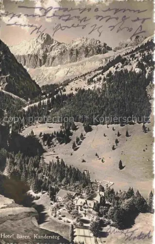 AK / Ansichtskarte Kandersteg BE Hotel-Baeren Bergtal Wald Wiesen Berge Felsformationen Alpenlandschaft