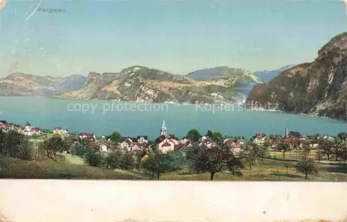 AK / Ansichtskarte Hergiswil Vierwaldstaettersee NW Vierwaldstaettersee Dorf Kirche Berge See Baeume Panorama