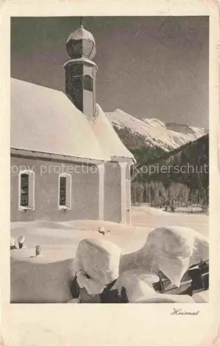AK / Ansichtskarte Laret Davos Klosters GR Kapelle Kirchturm Schnee Winter Berge Wald Zwiebeldach Weihnachtsgruss