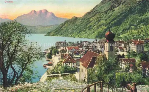 AK / Ansichtskarte Gersau Vierwaldstaettersee SZ Vierwaldstaettersee Kirche Dorf Berge Pilatus See Haeuser Ufer Abendrot