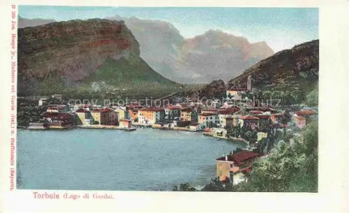 AK / Ansichtskarte Torbole Lago di Garda Trento IT Lago-di-Garda Ortspanorama Berge Seeufer Kirche Haeuser