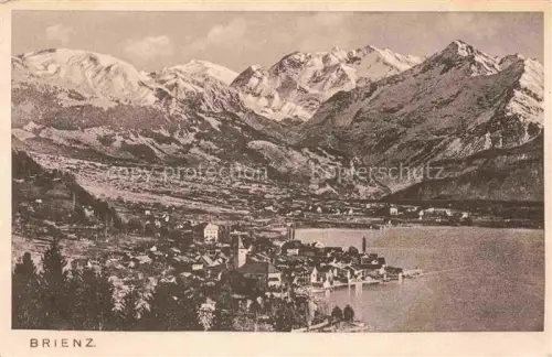 AK / Ansichtskarte Brienz Brienzersee BE Brienzersee See Ortschaft Kirche Berge Schnee Tal Haeuser