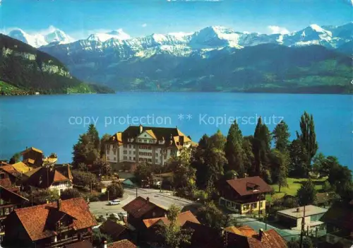 AK / Ansichtskarte Gunten Thunersee BE Thunersee Park-Hotel Eiger Moench Jungfrau Dorfansicht See Alpen