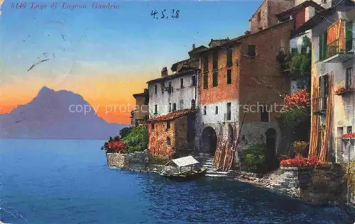 AK / Ansichtskarte Gandria Lago di Lugano TI Lago-di-Lugano Haeuser Ufer Boot Berge Abenddaemmerung