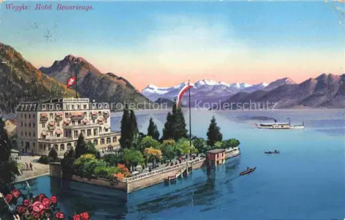 AK / Ansichtskarte Weggis Vierwaldstaettersee LU Hotel-Beau-Rivage Vierwaldstaettersee Dampfschiff See Berge Schweizer-Flagge