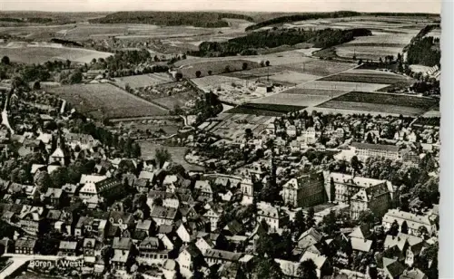 AK / Ansichtskarte Bueren Westfalen Paderborn NRW Luftaufnahme Altstadt Felder Kirche Daecher Baeume