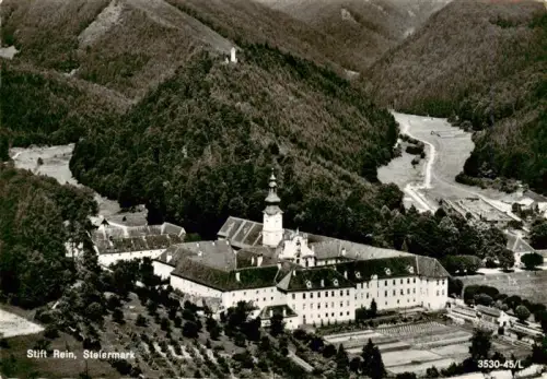 AK / Ansichtskarte Stift Rein Kloster Steiermark AT Stift-Rein Kloster Stiftskirche Luftaufnahme Wald Berge Garten Barockturm