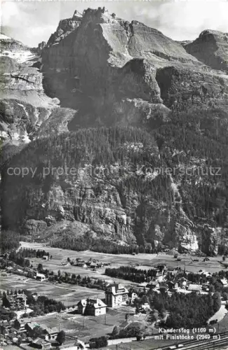 AK / Ansichtskarte Kandersteg BE Fisistoecke Felswand Dorf Tal Bergkette Wald Wiesen Kirche